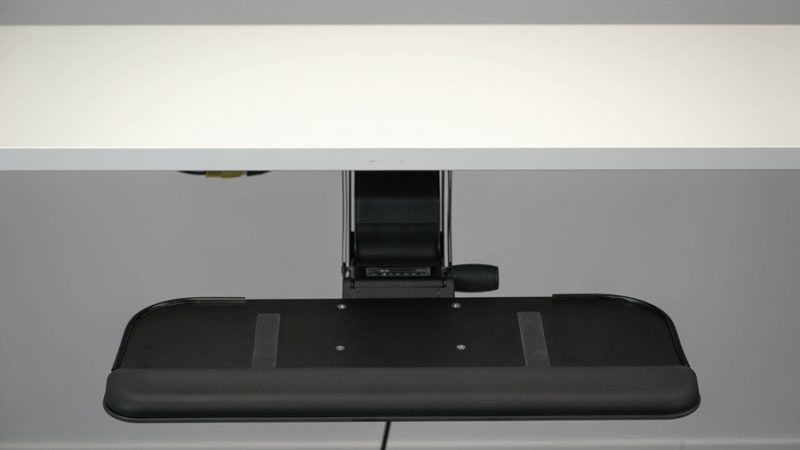 HON-Coordinate-standing-desk_keyboard-tray_245e-keyboard-tray-with-trackless-arm_close-up-800x450