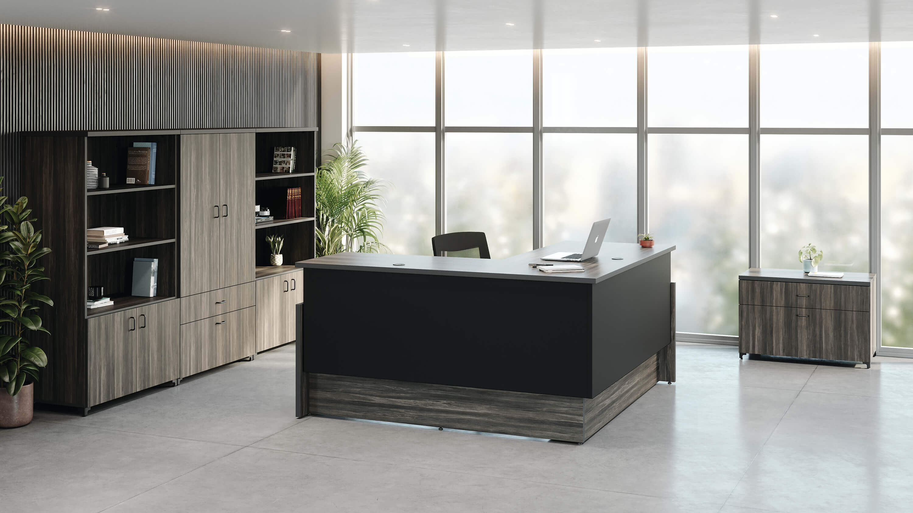 Presidente Executive fully enclosed L shape electric standing desk in standing position in modern private office with Tevita laminate vertical and credenza storage system